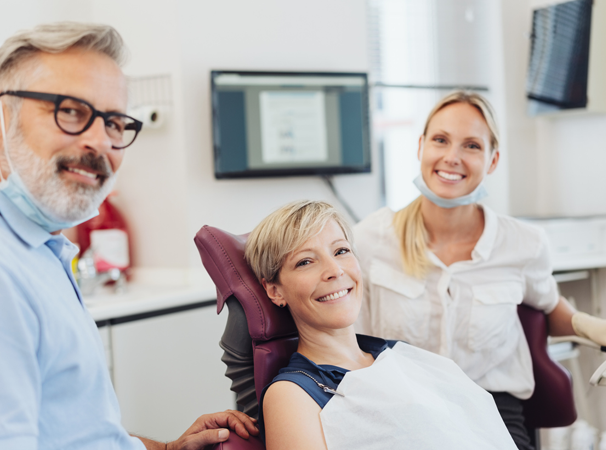 Smiling doctor and patient