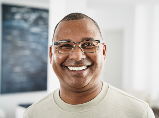 Smiling man with glasses